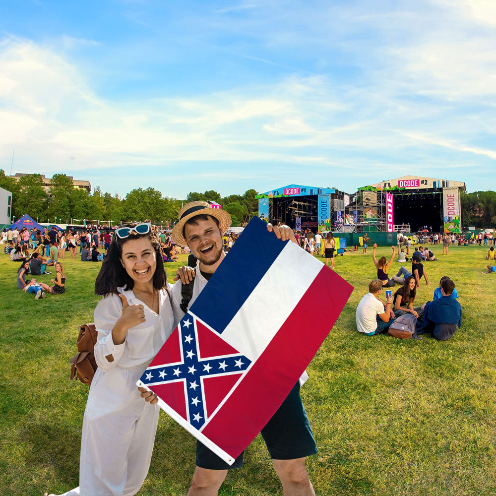 Man & Woman holding Mississippi 1894 Printed Polyester Flag 2ft by 3ft at Outdoor Festival